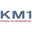 KM 1