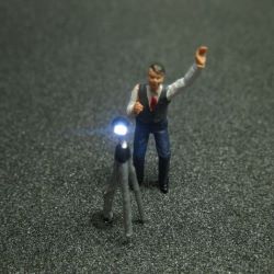 50228 Fotograf mit LED Blitz Beleuchtung